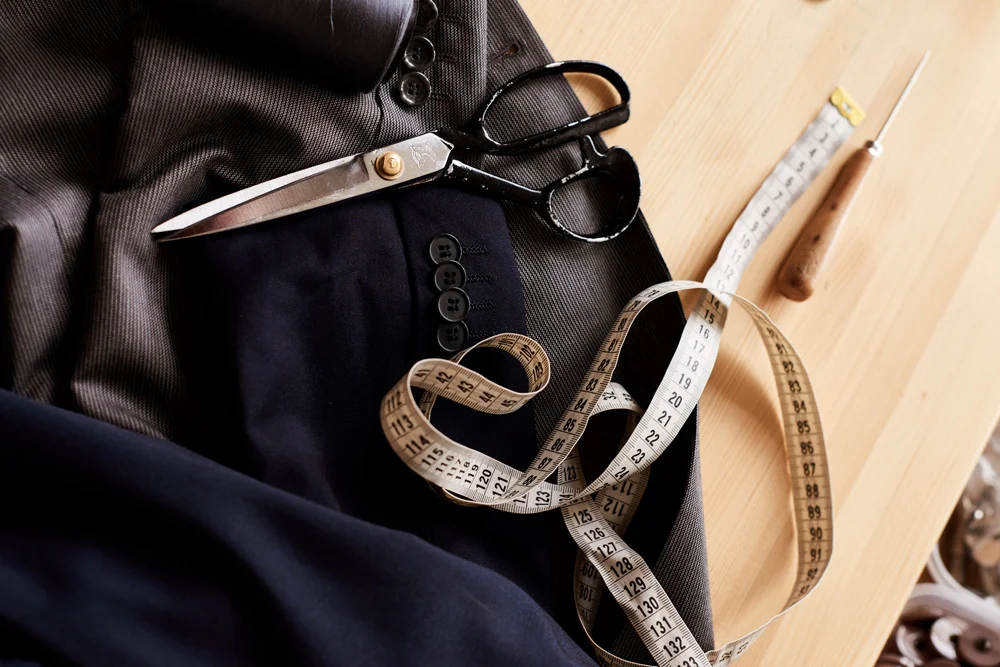 Tailoring tools and materials arranged on a worktable
